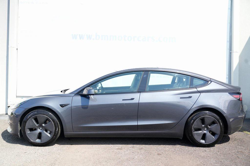 used 2023 Tesla Model 3 car, priced at $25,700
