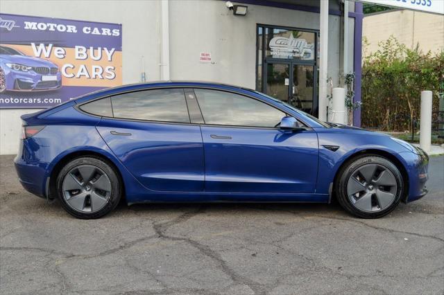 used 2022 Tesla Model 3 car, priced at $25,900