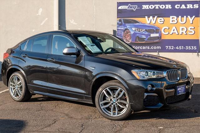 used 2018 BMW X4 car, priced at $22,900