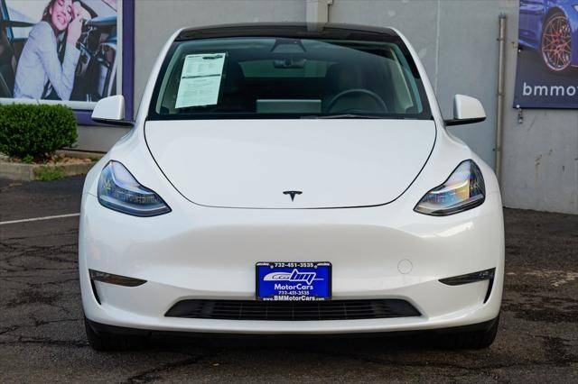 used 2023 Tesla Model Y car, priced at $30,900