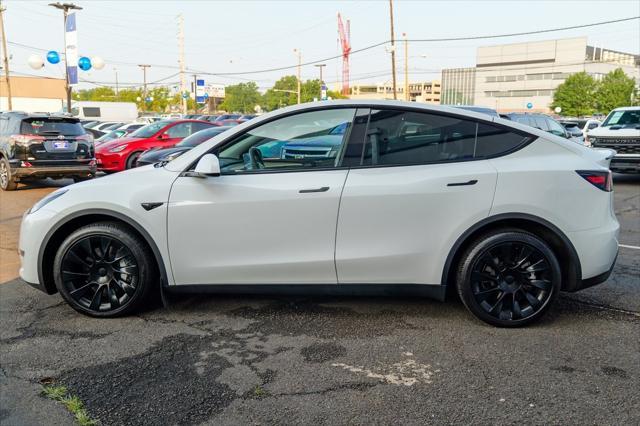 used 2023 Tesla Model Y car, priced at $30,900