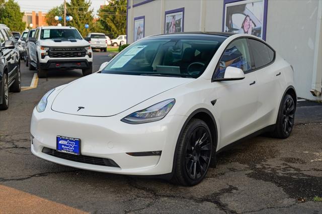 used 2023 Tesla Model Y car, priced at $30,900