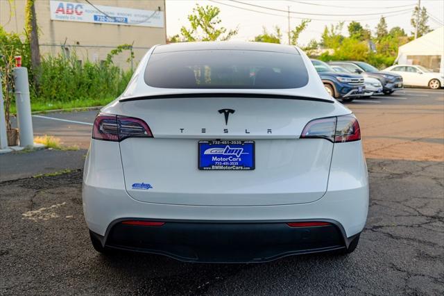 used 2023 Tesla Model Y car, priced at $30,900