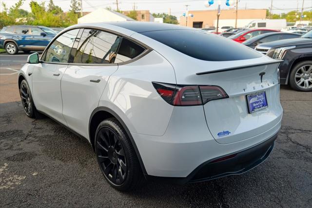 used 2023 Tesla Model Y car, priced at $30,900