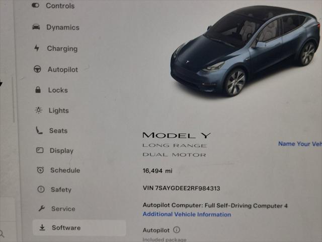 used 2024 Tesla Model Y car, priced at $33,900