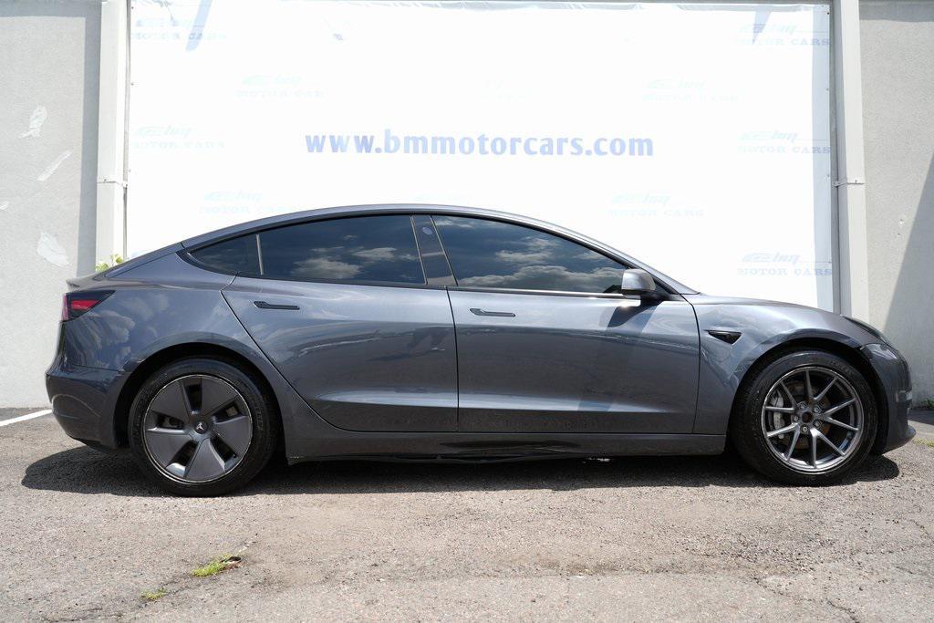 used 2023 Tesla Model 3 car, priced at $23,900