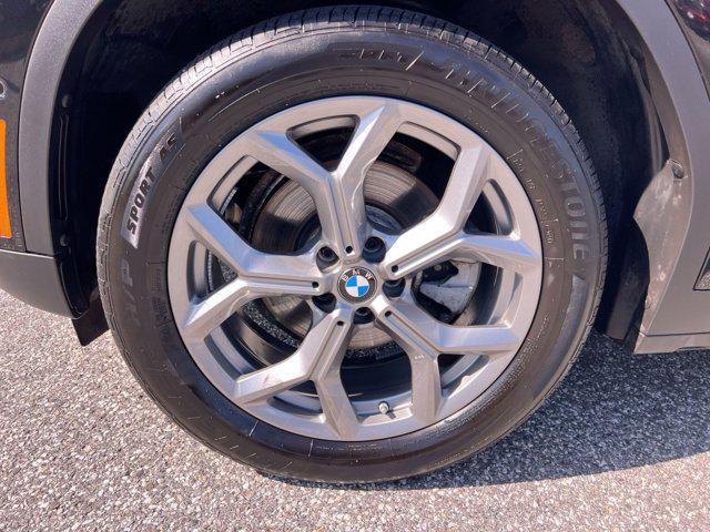 used 2024 BMW X4 car, priced at $42,500