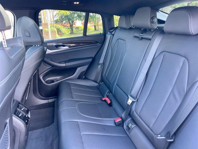 used 2024 BMW X4 car, priced at $42,500