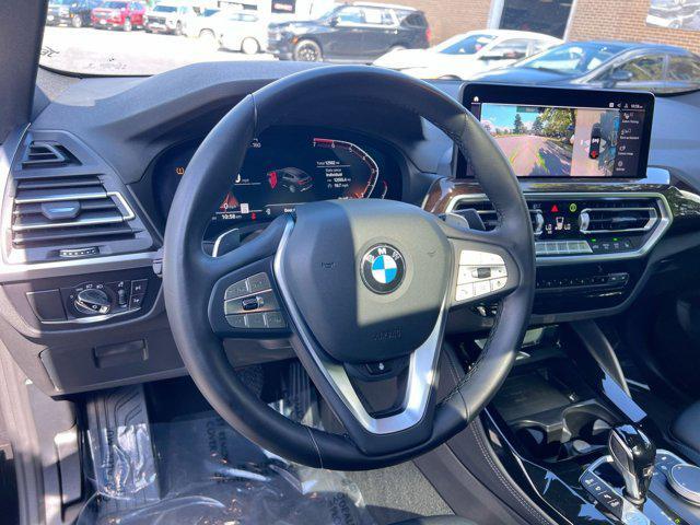 used 2024 BMW X4 car, priced at $42,500