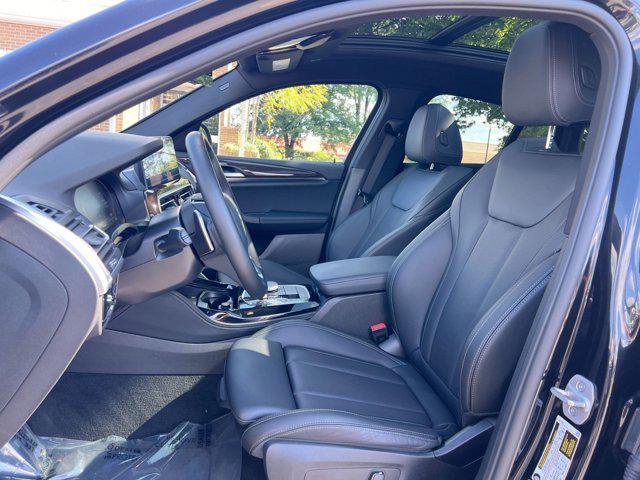 used 2024 BMW X4 car, priced at $42,500