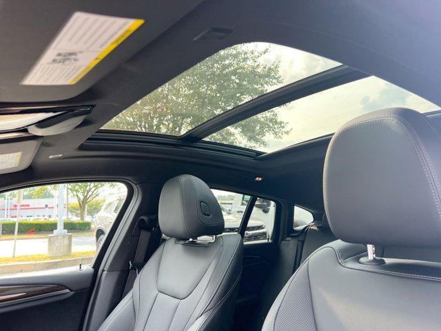 used 2024 BMW X4 car, priced at $42,900
