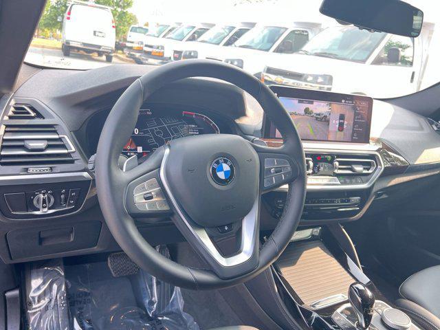 used 2024 BMW X4 car, priced at $42,900