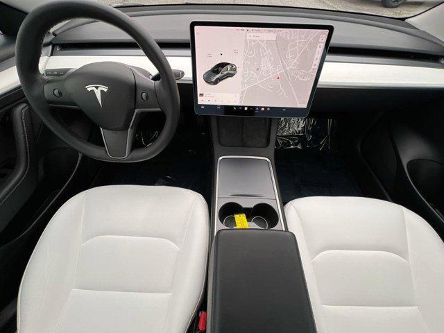 used 2022 Tesla Model 3 car, priced at $23,000