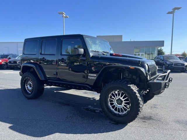 used 2014 Jeep Wrangler Unlimited car, priced at $15,877