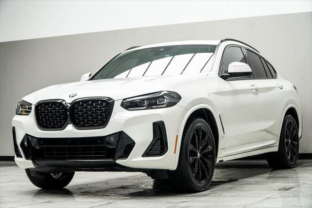 used 2022 BMW X4 car, priced at $40,900