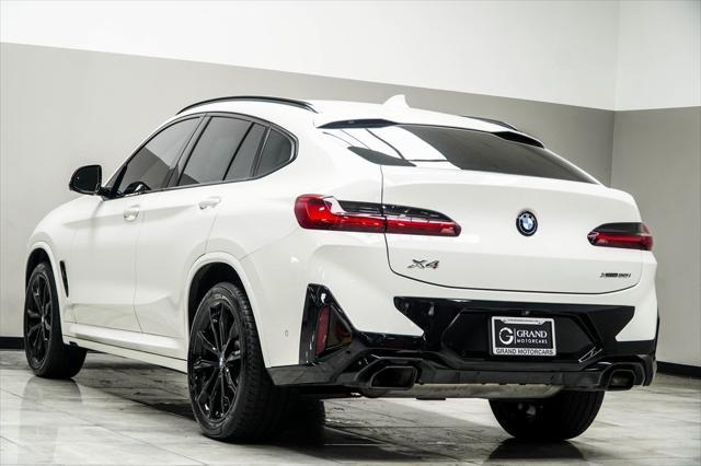 used 2022 BMW X4 car, priced at $40,900