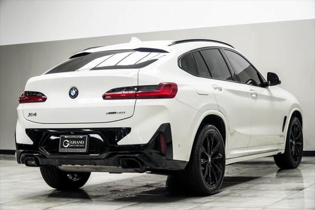 used 2022 BMW X4 car, priced at $40,900