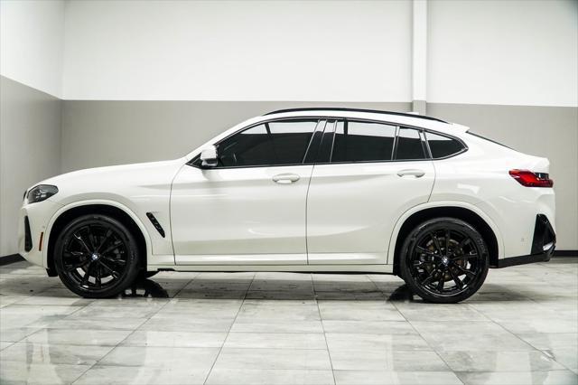 used 2022 BMW X4 car, priced at $40,900