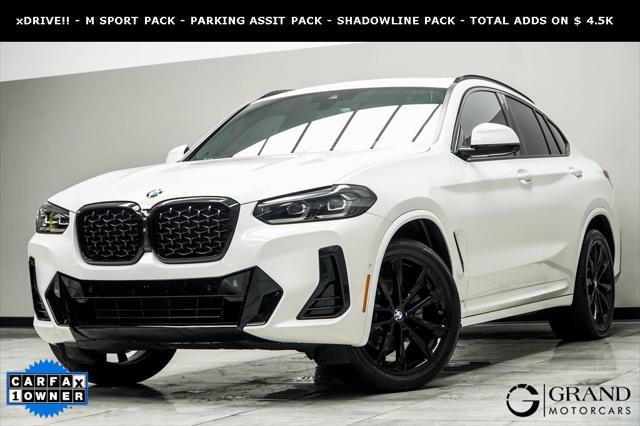 used 2022 BMW X4 car, priced at $40,900