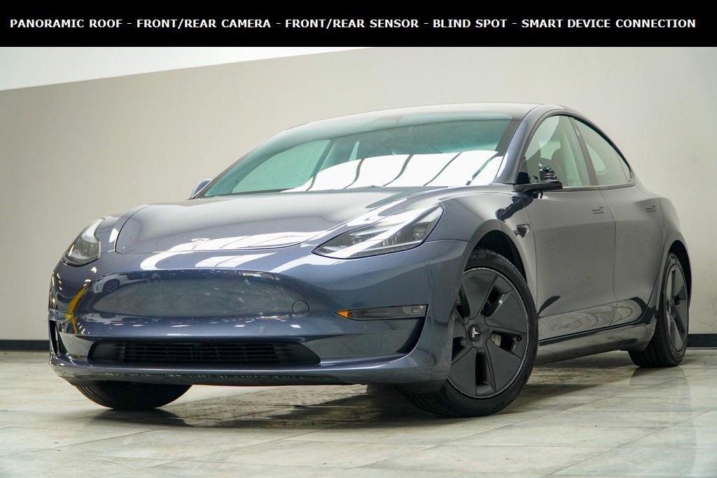 used 2022 Tesla Model 3 car, priced at $23,750