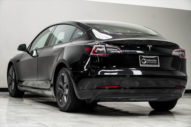 used 2023 Tesla Model 3 car, priced at $25,996