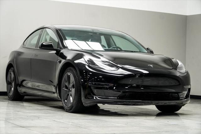 used 2023 Tesla Model 3 car, priced at $25,996