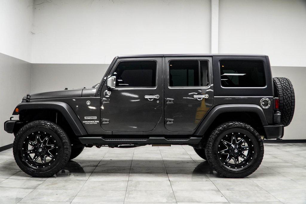used 2017 Jeep Wrangler Unlimited car, priced at $17,871
