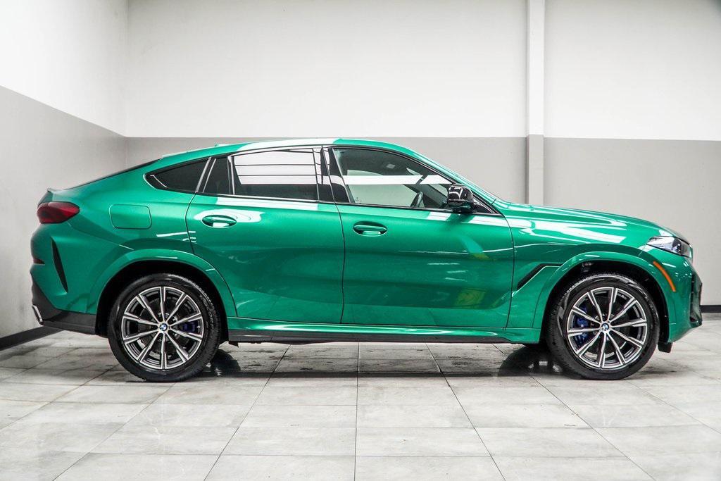 used 2025 BMW X6 car, priced at $83,998