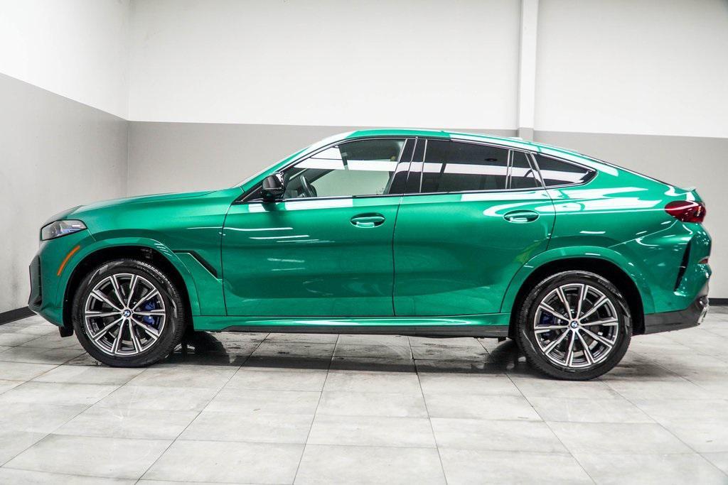 used 2025 BMW X6 car, priced at $83,998