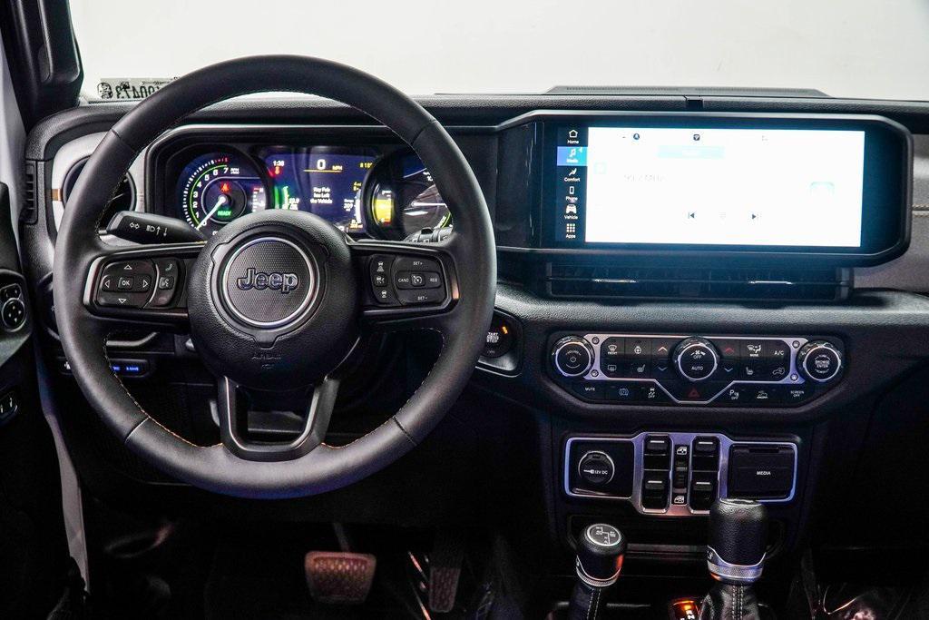 used 2024 Jeep Wrangler 4xe car, priced at $34,821