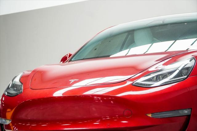 used 2021 Tesla Model 3 car, priced at $27,422