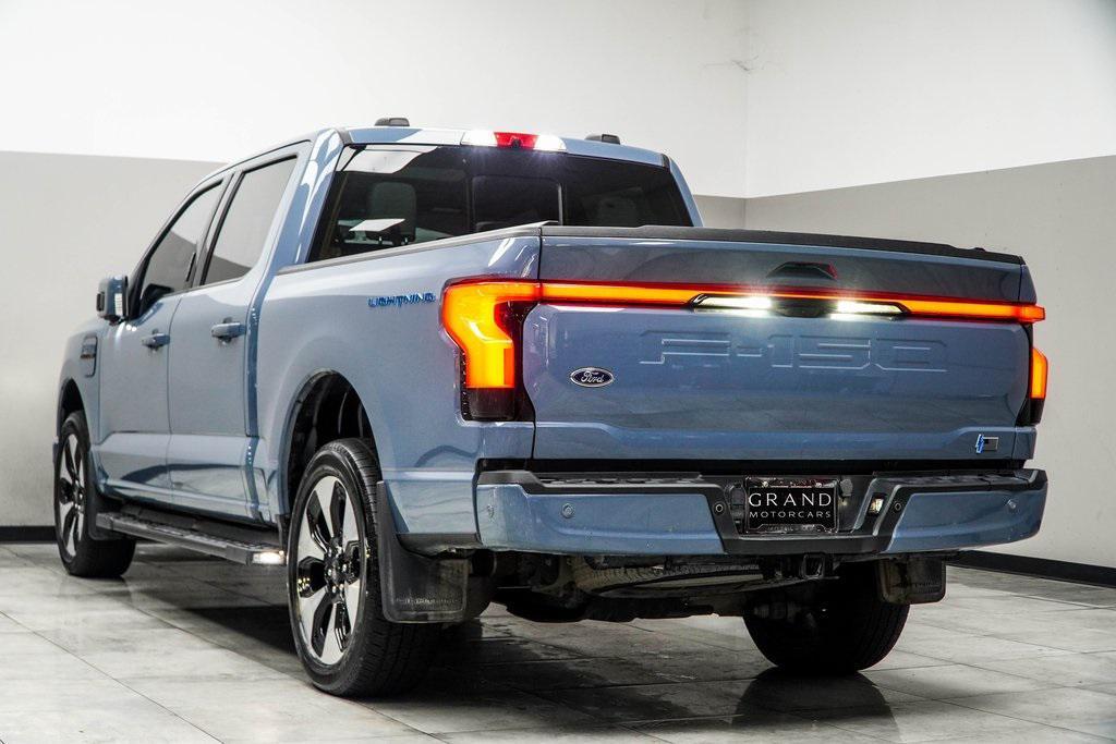 used 2023 Ford F-150 Lightning car, priced at $53,699