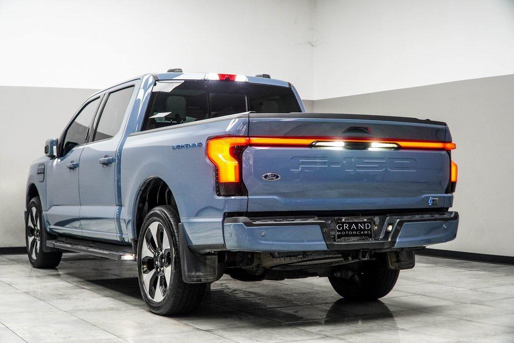 used 2023 Ford F-150 Lightning car, priced at $53,699