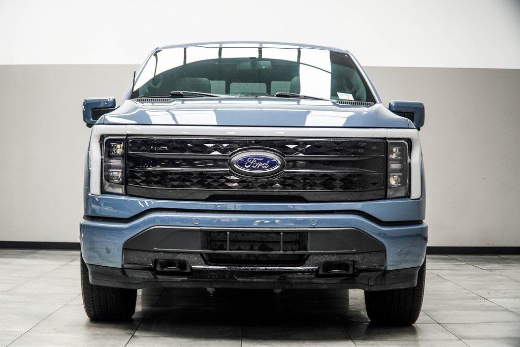 used 2023 Ford F-150 Lightning car, priced at $53,699