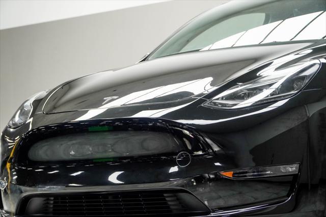 used 2024 Tesla Model Y car, priced at $34,430