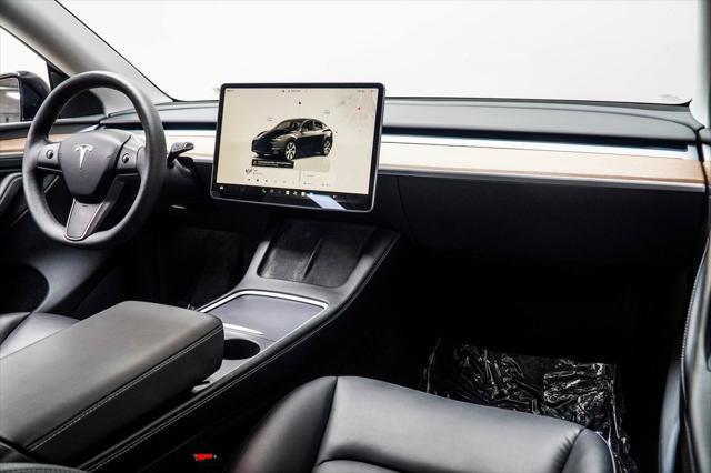 used 2024 Tesla Model Y car, priced at $34,430
