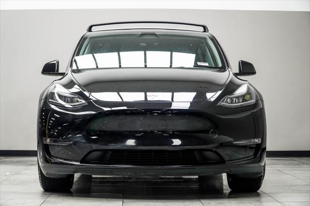 used 2024 Tesla Model Y car, priced at $34,430