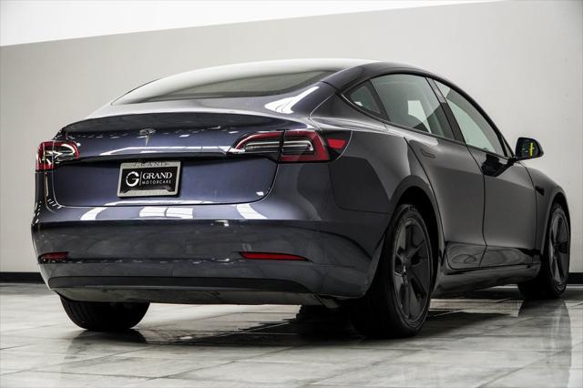 used 2023 Tesla Model 3 car, priced at $25,997