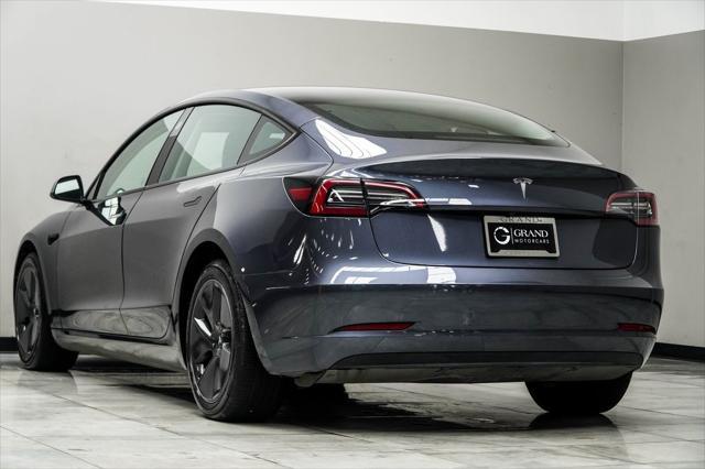 used 2023 Tesla Model 3 car, priced at $25,997