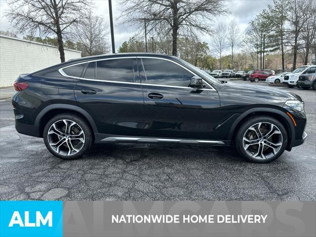 used 2022 BMW X6 car, priced at $51,220