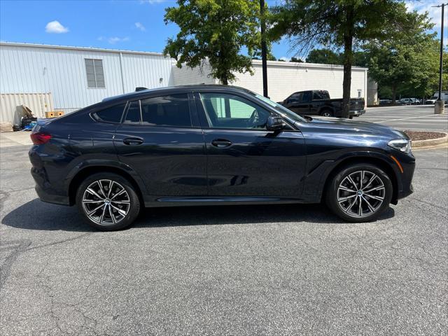 used 2023 BMW X6 car, priced at $54,920