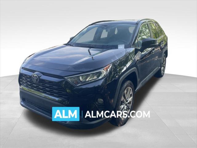 used 2021 Toyota RAV4 car, priced at $29,390