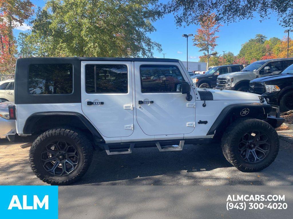 used 2017 Jeep Wrangler Unlimited car, priced at $19,320