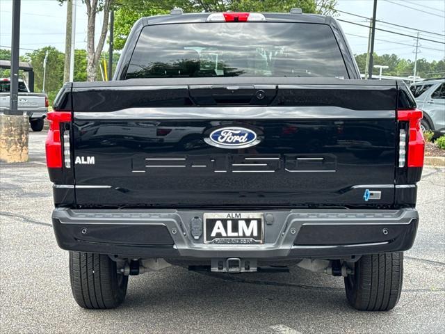 new 2025 Ford F-150 Lightning car, priced at $74,060
