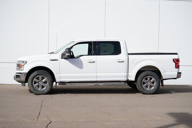 used 2018 Ford F-150 car, priced at $13,500