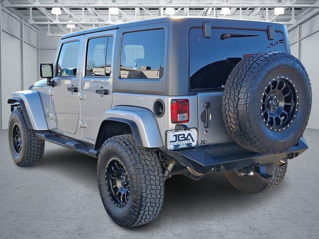 used 2018 Jeep Wrangler JK Unlimited car, priced at $27,497