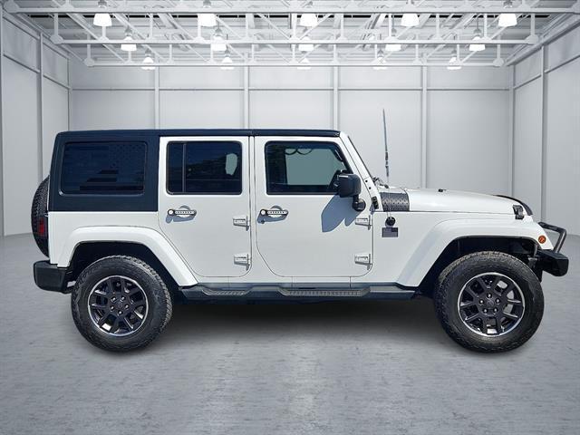 used 2012 Jeep Wrangler Unlimited car, priced at $14,997
