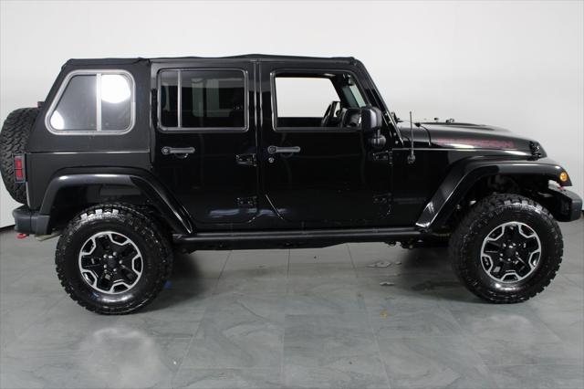 used 2016 Jeep Wrangler Unlimited car, priced at $25,587