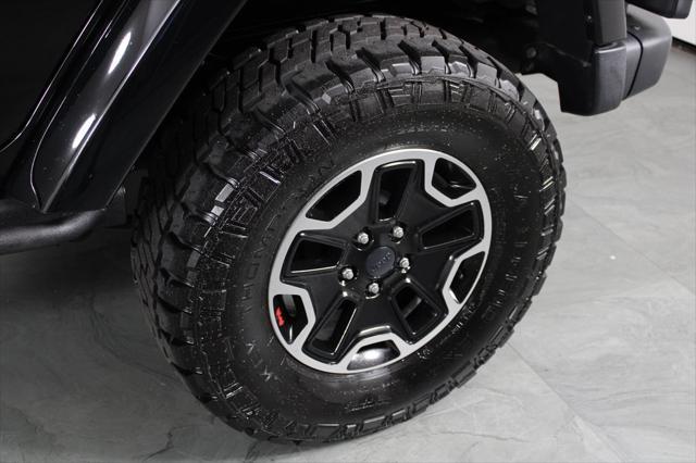 used 2016 Jeep Wrangler Unlimited car, priced at $25,587