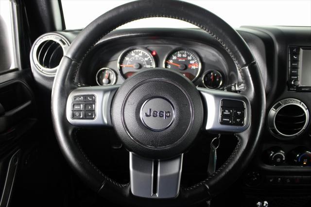 used 2016 Jeep Wrangler Unlimited car, priced at $25,587